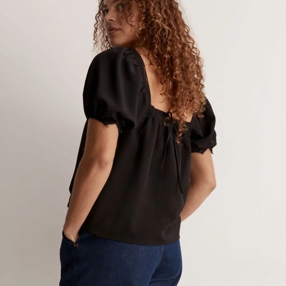 Madewell black seersucker puff sleeve blouse